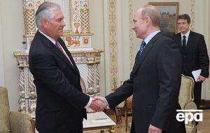 Рекс Тиллерсон и Владимир Путин на встрече в Москве в 2012 году