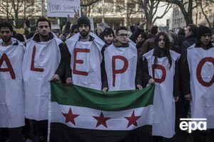 В Берлине у посольства РФ прошла акция протеста против бомбардировок Алеппо. Фоторепортаж