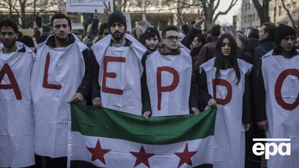 В Берлине у посольства РФ прошла акция протеста против бомбардировок Алеппо. Фоторепортаж