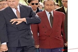 Иллюстрация к фразе Киселева о том, что Путин ходит в пиджаках стандартного покроя