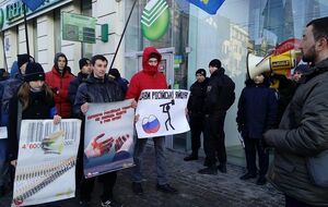 В ряде областных центров прошла акция против присутствия в Украине российского бизнеса. Фоторепортаж