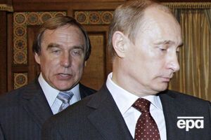 Ролдугин (на заднем плане) действительно кредитовался Ротенбергом, пишет РБК