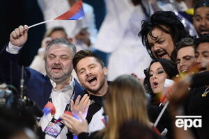 Лазарев (на фото в центре) получил от Украины 12 баллов