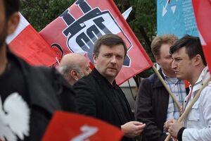 Матеуша Пискорского (в центре) арестовали по подозрению в шпионаже в пользу России