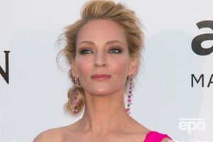 Турман продала откровенный поцелуй на благотворительном аукционе