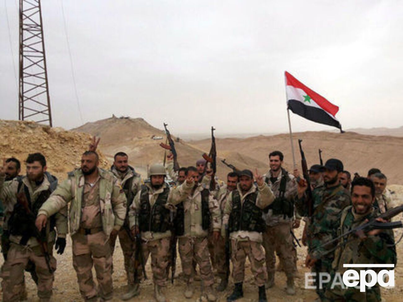 Сирийская армия празднует освобождение Пальмиры