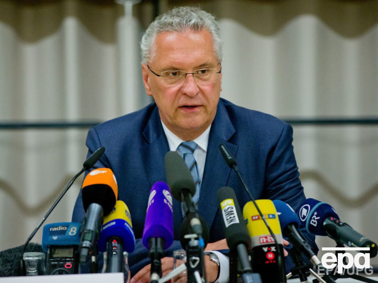 Герман заявил, что полиция нашла доказательство связи смертника, подорвавшегося в Ансбахе, с ИГИЛ