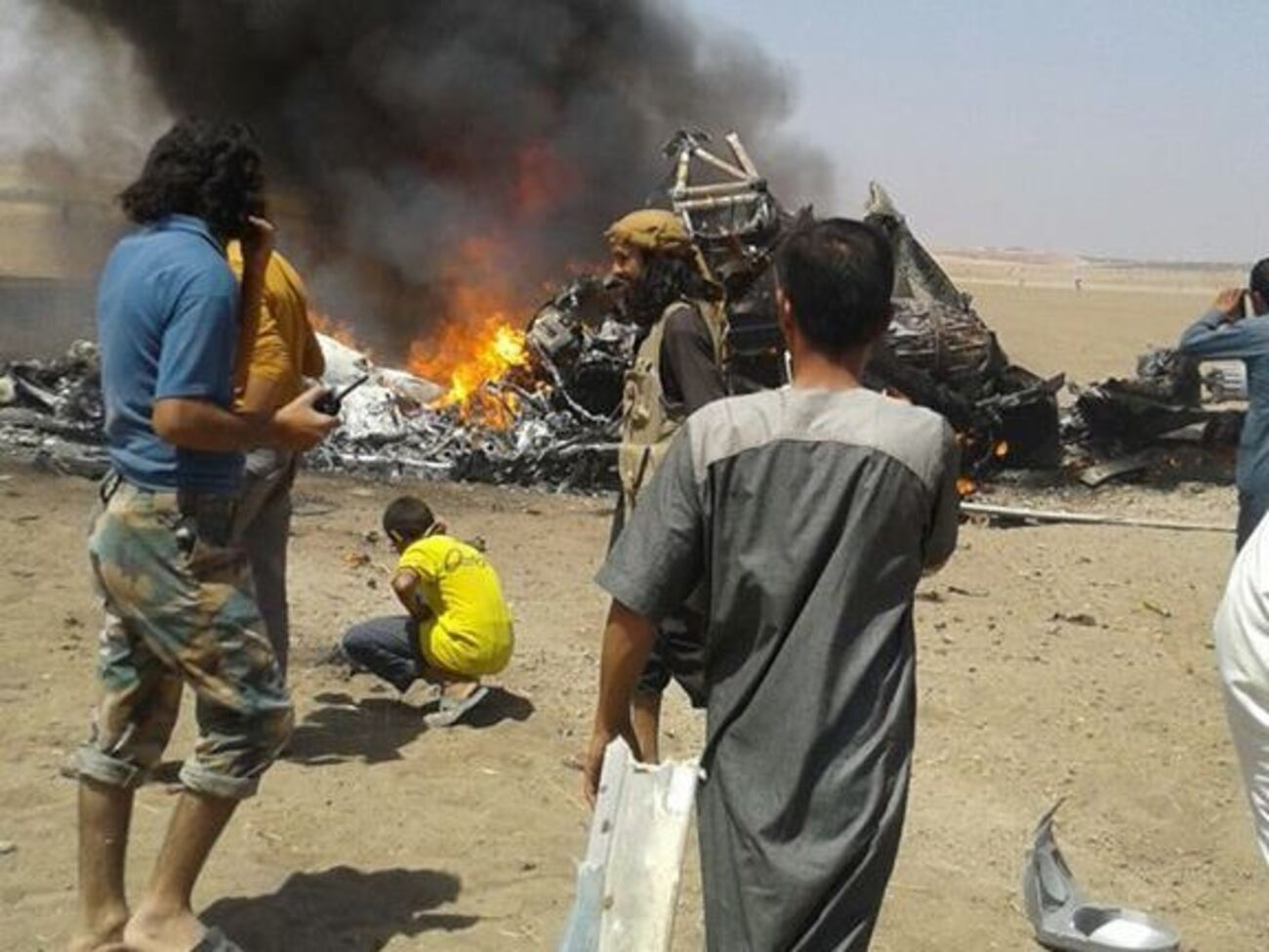 Издание Syria Today опубликовало снимок с предполагаемого места падения вертолета