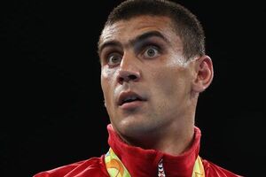 Тищенко (на фото) в финале олимпийского турнира победил боксера из Казахстана Василия Левита