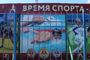 Дизайнер просто заменил Фелпсу флаг на российский