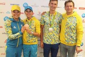 Тимощенко и Ризатдинов (на фото по центру) вернулись в Украину