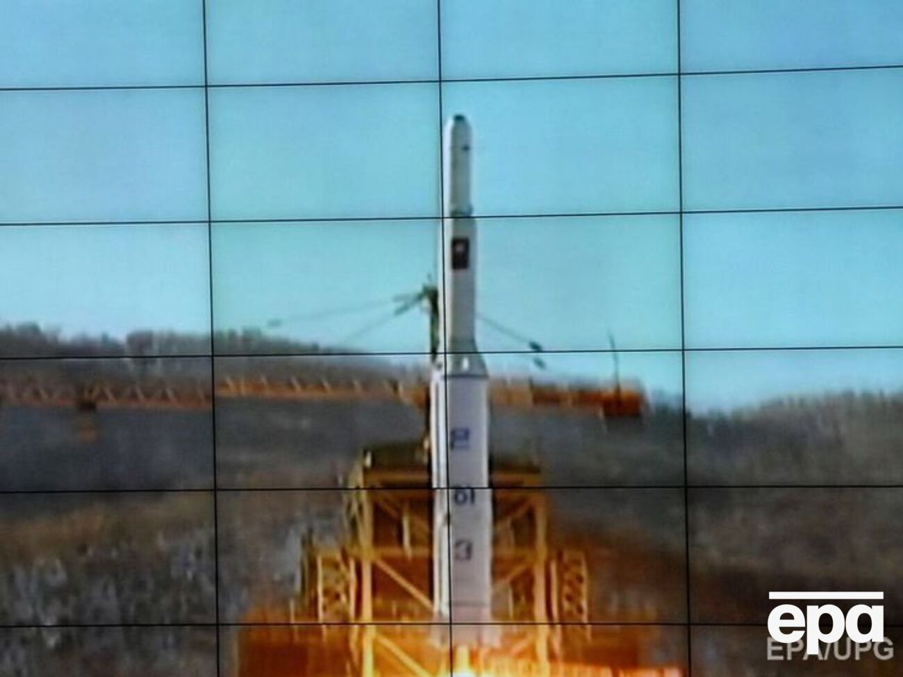 Запуск северокорейской ракеты "Ынха-3", показанный по телевидению КНДР, 2012 год