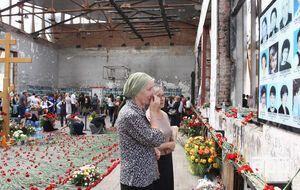 Фото сделано 3 сентября 2014 года. В результате нападения на школу и штурма здания погибли 334 человека, более 800 были ранены