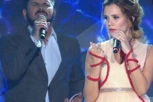 Безрук спела с латвийским певцом Бусулисом
