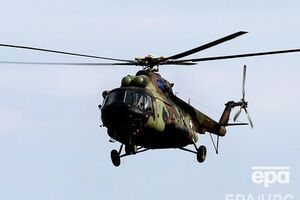 Вертолет ищут восемь военных самолетов