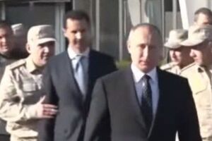 Российский военный придержал Асада за локоть