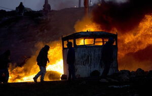 Активисты протестуют против эвакуации из незаконного еврейского поселения. Фоторепортаж