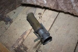 На чердаке был обнаружен фрагмент заряда от гранатомета