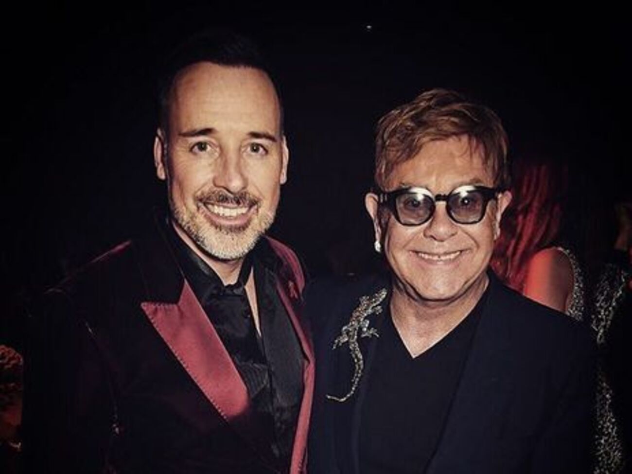 Элтон Джон (справа) считает, что наличие в семье детей имеет огромное значение