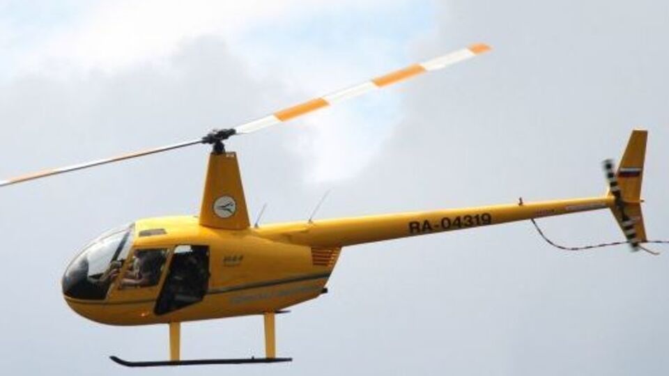 Один из вертолетов Robinson, принадлежащих компании "Лайт Эйр"