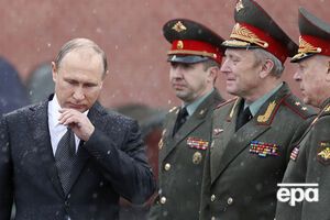 Путін ненадовго залишився без парасольки, унаслідок чого промок