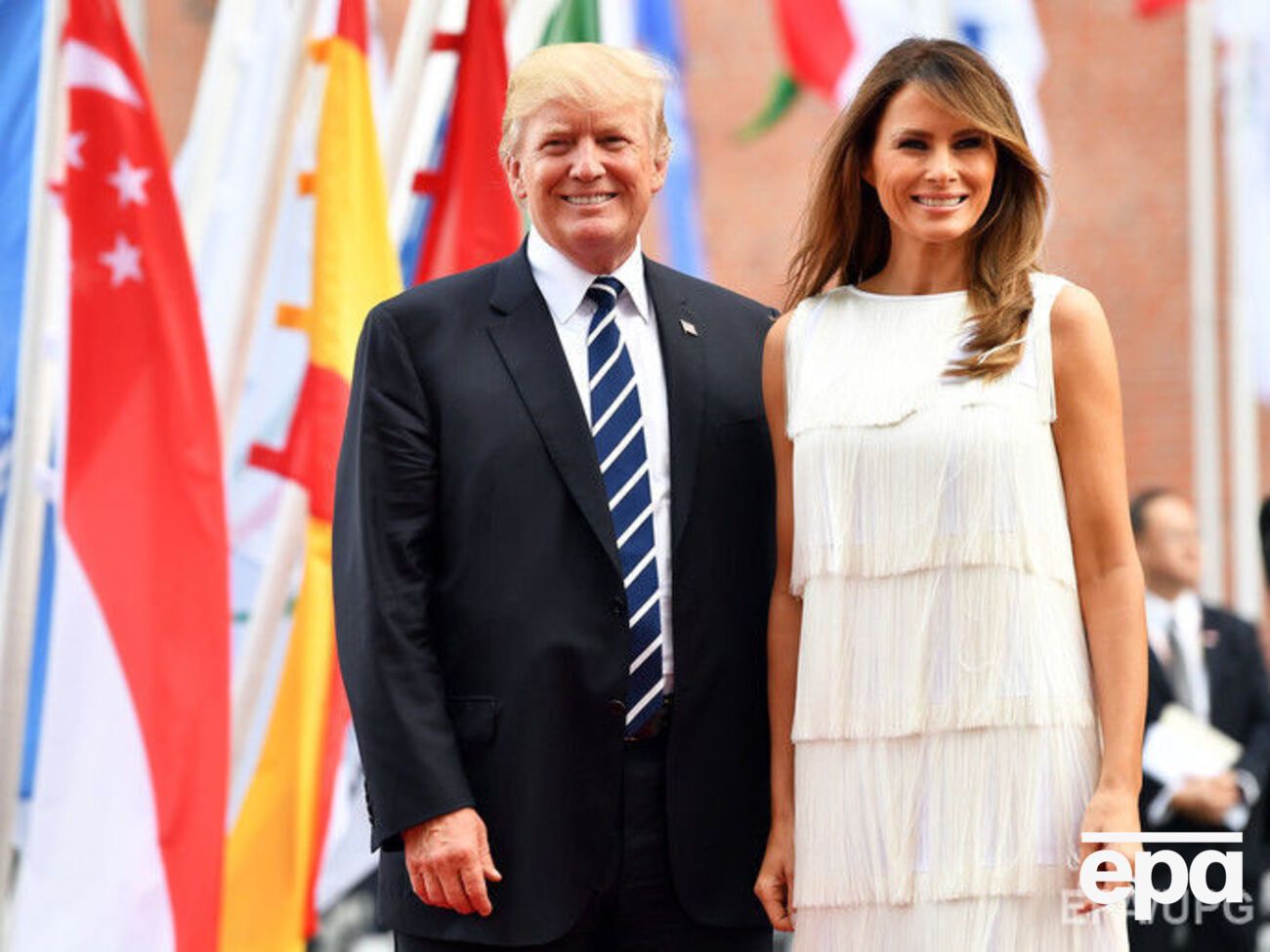 Трамп прибыл на саммит вместе со своей женой Меланьей