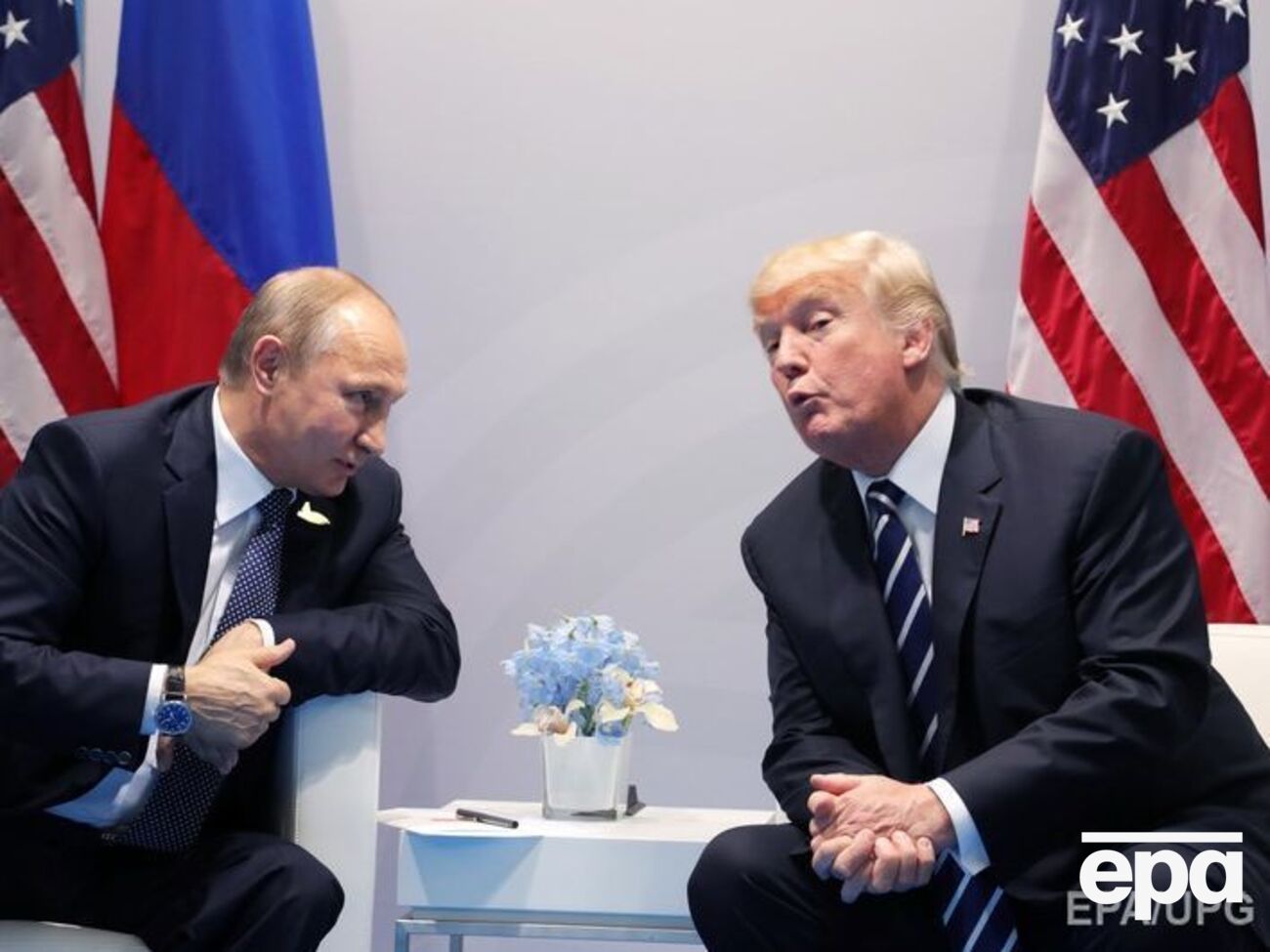 Путин и Трамп во время встречи в июле