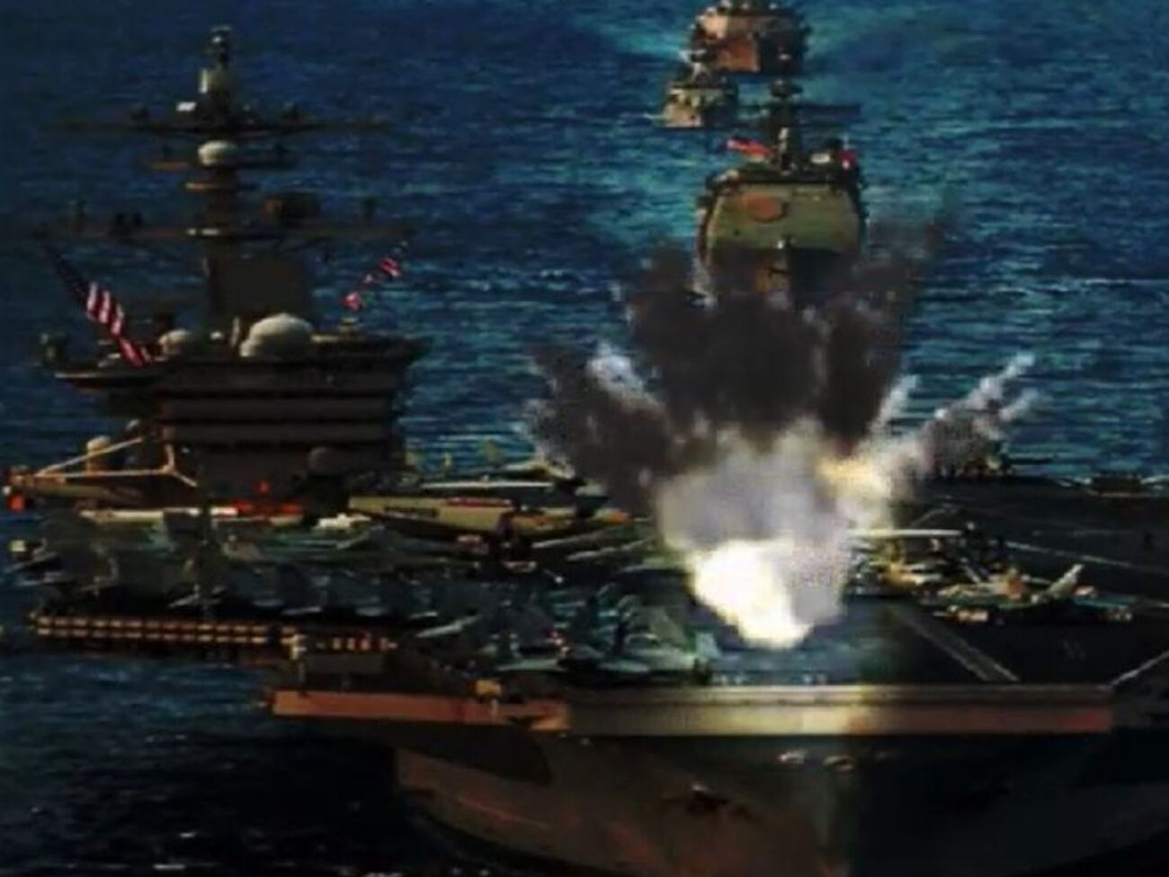 В коллаже показали взрыв на авианосце США