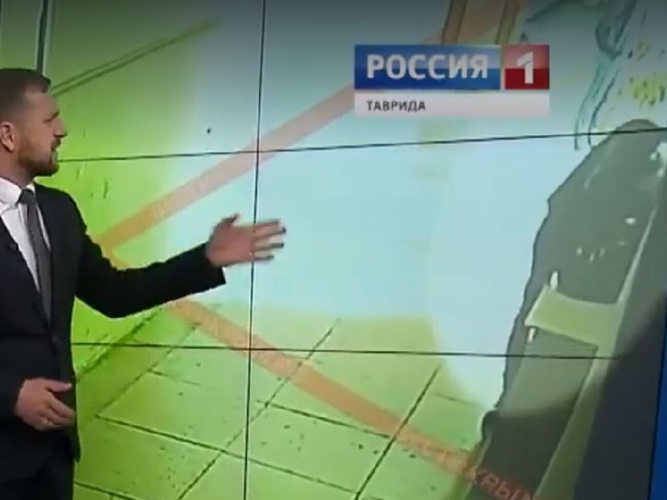 Можливим куратором назвали чоловіка, який стоїть недалеко від Рослякова (виділено світлим), коли той готує вибуховий пакет