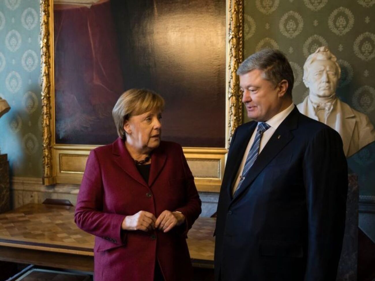 Порошенко зустрівся з Меркель 13 грудня