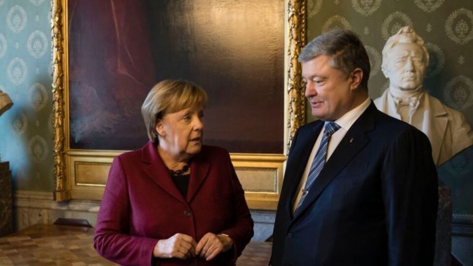 Порошенко зустрівся з Меркель 13 грудня