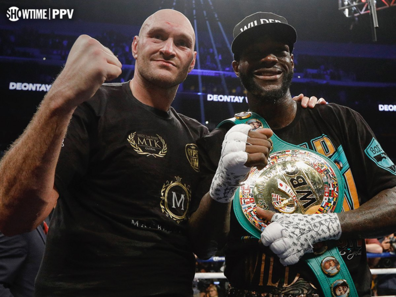 Ф'юрі (ліворуч) і Вайлдер залишилися непереможеними боксерами