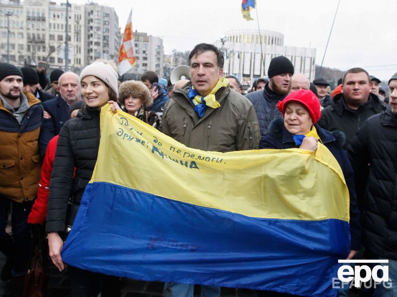 Саакашвили (в центре) хочет стать частью "успеха Украины"