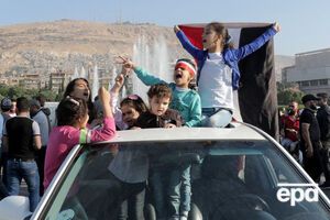 Авиаудары США и союзников по Сирии: жители Дамаска вышли на митинг в поддержку Асада. Фоторепортаж