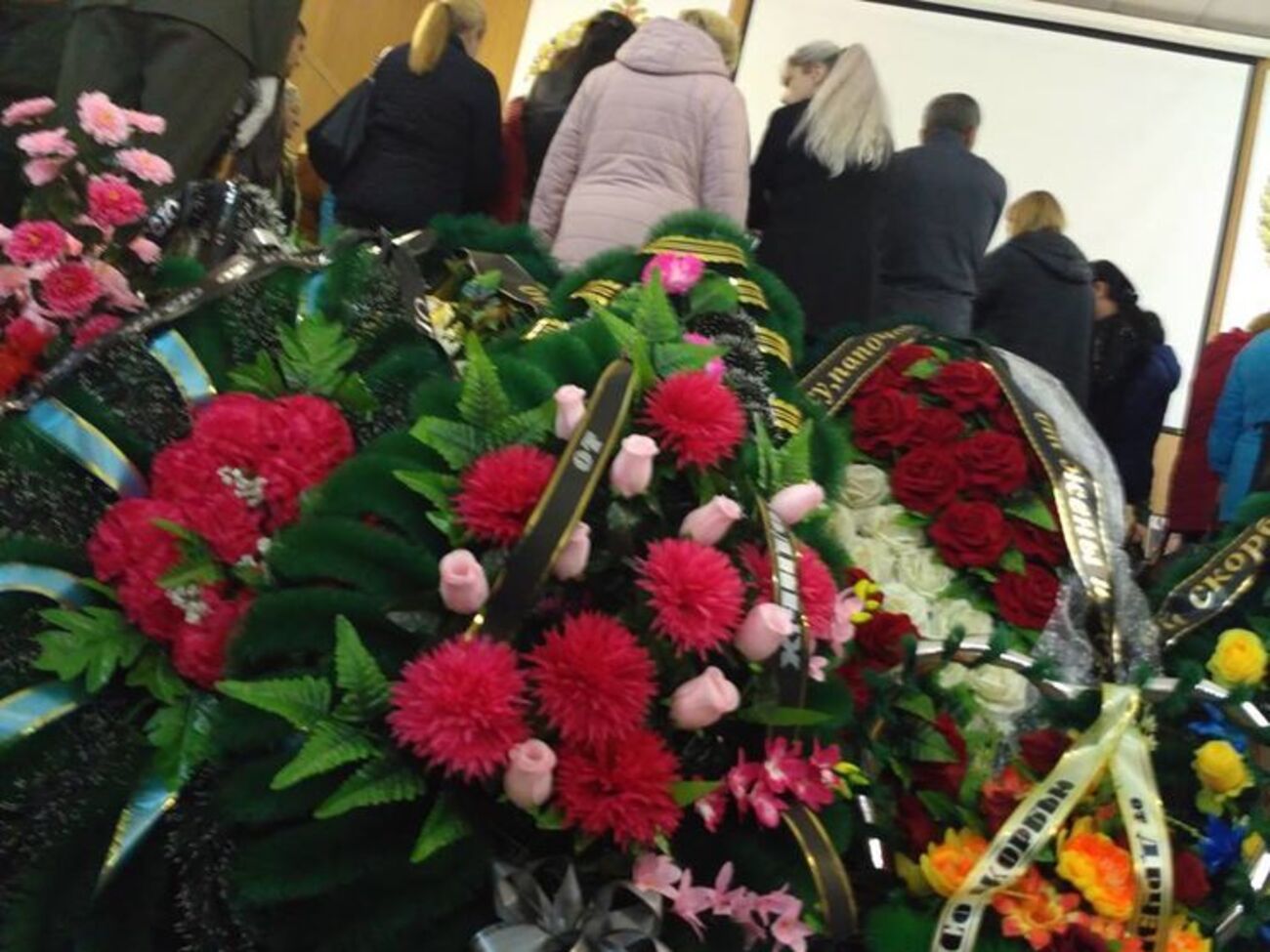 Двох росіян поховали в закритих домовинах