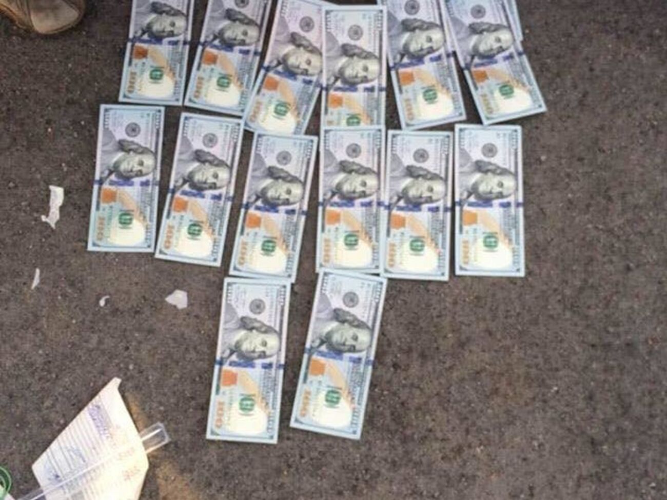 Під час обшуку вилучили $2 тис. і 58 тис. грн