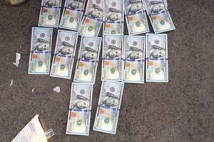 Під час обшуку вилучили $2 тис. і 58 тис. грн