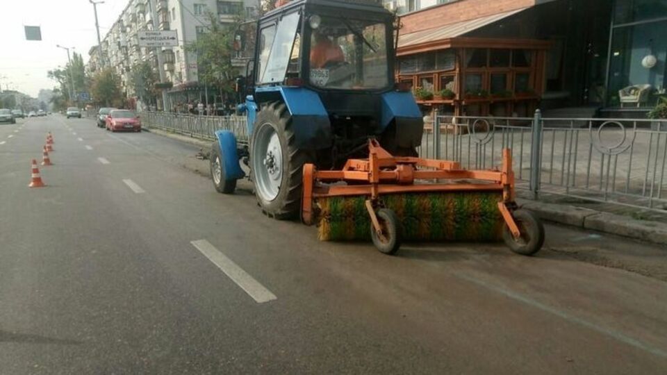 Підтоплений Київ розчищають після грози і дощу. Фоторепортаж