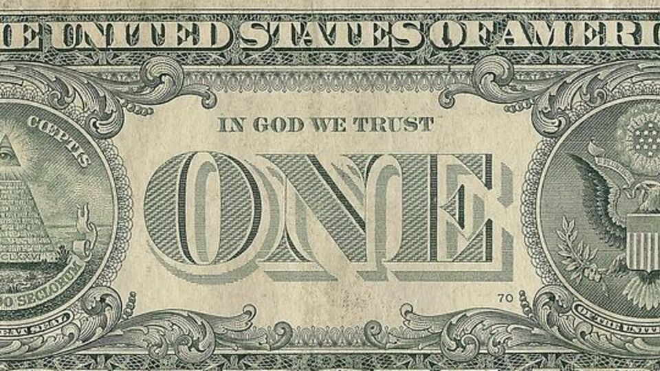 Фразу In God We Trust друкують на доларах із 60-х років минулого століття