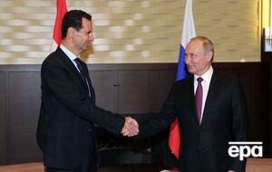 Телеграмму Путину Асад (слева) направил 19 сентября