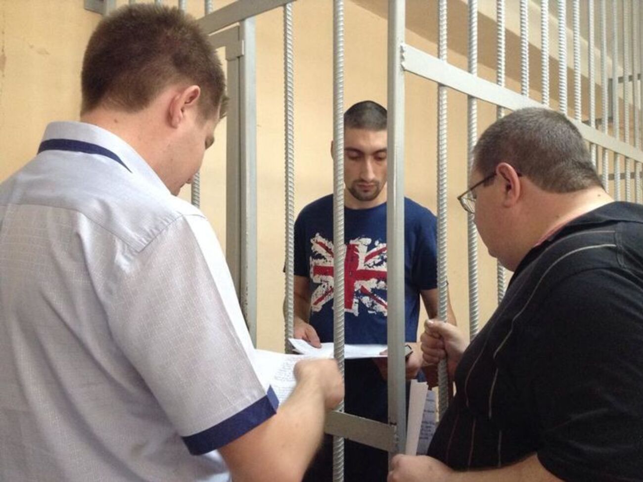 Кромского (в центре) приговорили в январе 2018 года