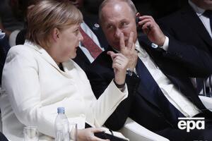 Путин и Меркель провели телефонный разговор