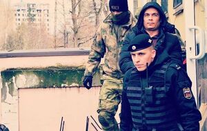 Курбединова дважды арестовывали из-за поста в Facebook от 2013 года с изображением символики форума организации "Хизб ут-Тахрир"