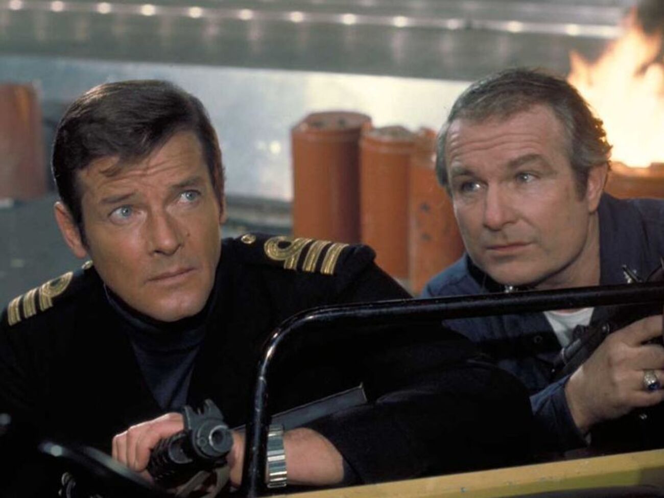 Ріммер (на фото праворуч) знявся у трьох фільмах про Джеймса Бонда