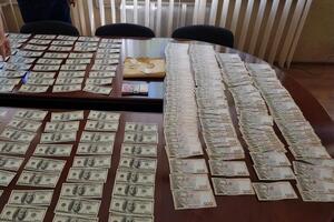 Во время обысков были изъяты деньги и документация