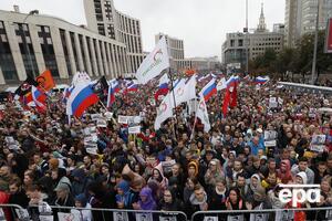 В Москве в санкционированной акции в поддержку оппозиционных кандидатов в Мосгордуму приняли участие около 49 тыс. человек. Фоторепортаж