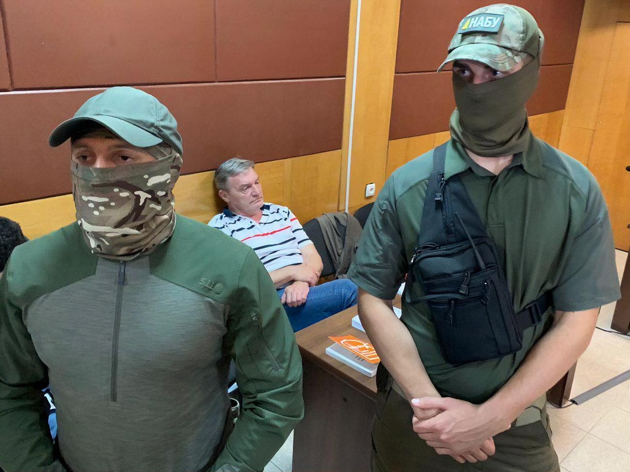 Грымчака (на фото сидит) арестовали на два месяца