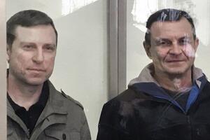 "Суд" приговорил Дудку (справа) и Бессарабова к 14 годам лишения свободы