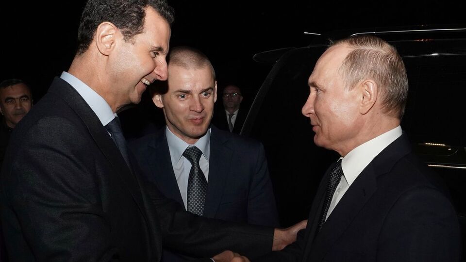 Визит Путина (на фото справа) не анонсировался