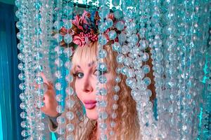 Білик в образі Августи – сексуальної глави медіакорпорації з роману "Дилер реальності"